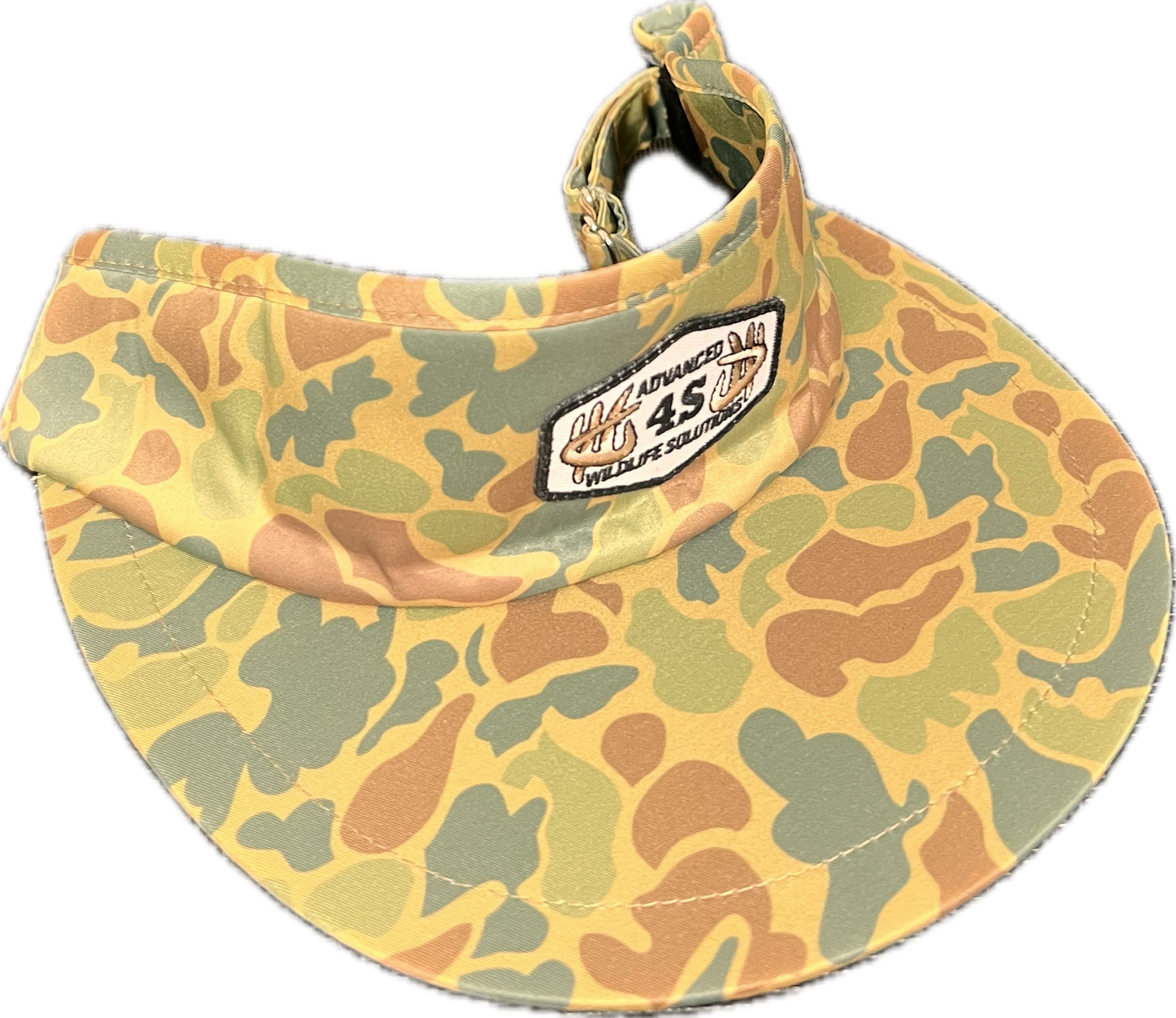 A camouflage tall visor with a white hexagon patch on the front and an adjustable buckle on the back.