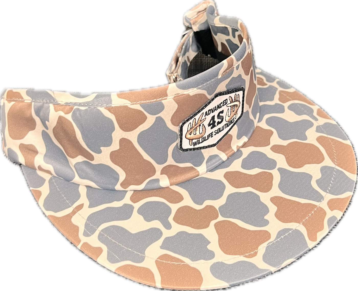 A beige, gray, and brown camouflage tall visor with an adjustable buckle and a white hexagon patch on the front.