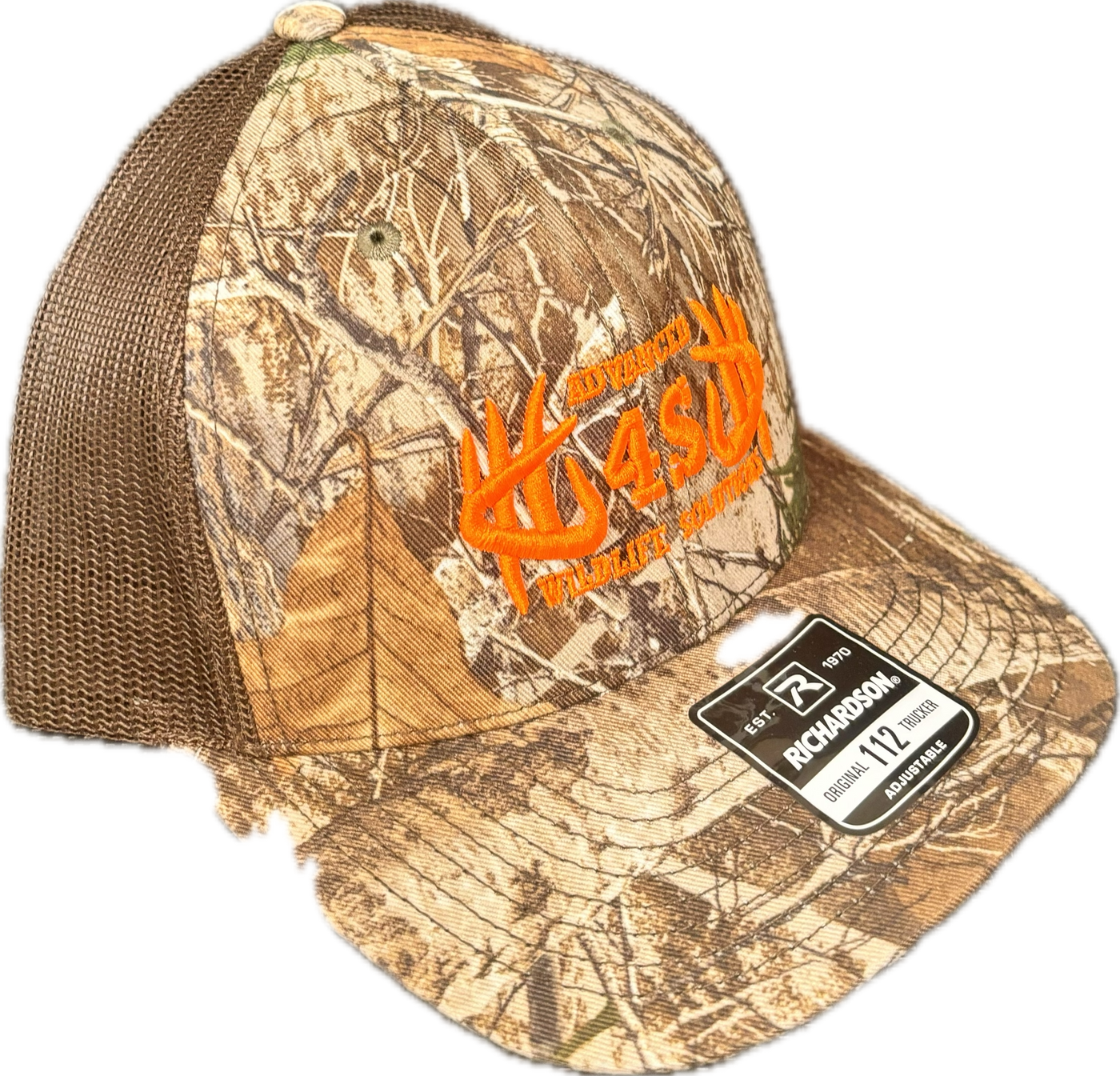 A brown mesh back Richardson 112 Realtree Edge cap with an orange logo on the front.