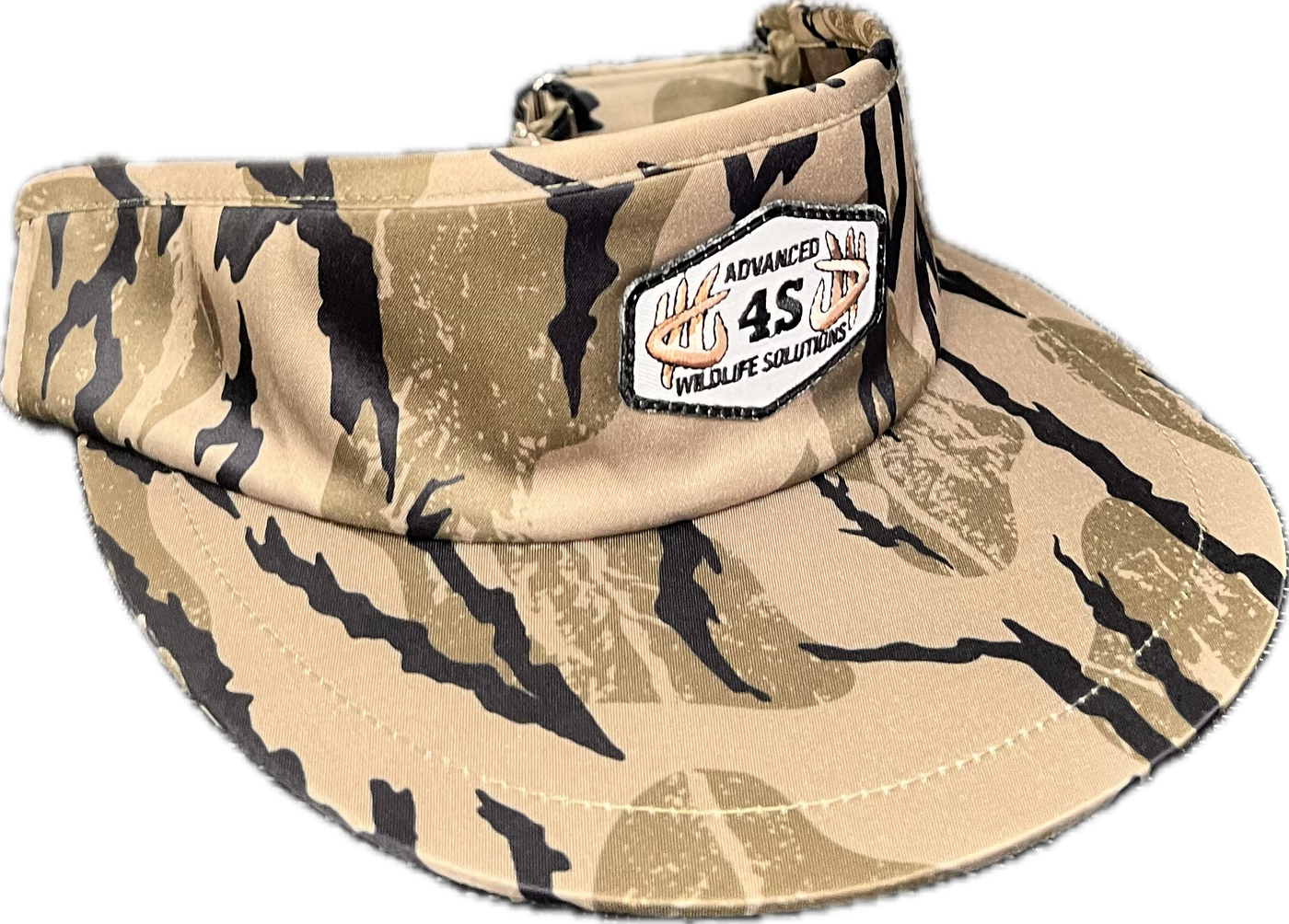 A camouflaged tall visor with a white hexagon patch and an adjustable buckle.